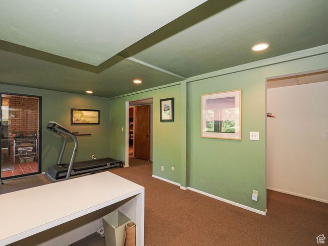 Office area with recessed lighting and dark carpet | Image 53