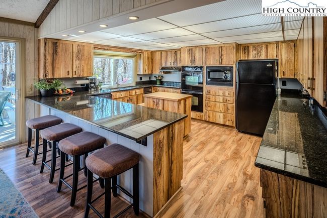 202 Cliffside Ln, House other with 4 bedrooms, 3 bathrooms and null parking in Seven Devils NC | Image 13