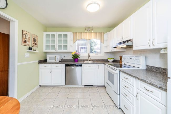 24 Ellery Cres, House other with 3 bedrooms, 2 bathrooms and 4 parking in Nepean ON | Image 21