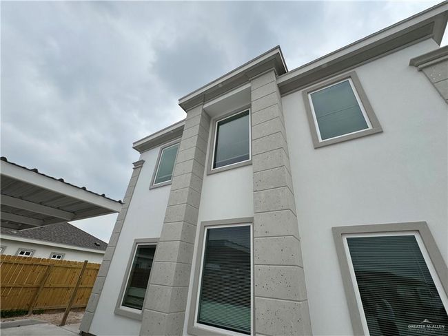 View of side of home featuring stucco siding | Image 20