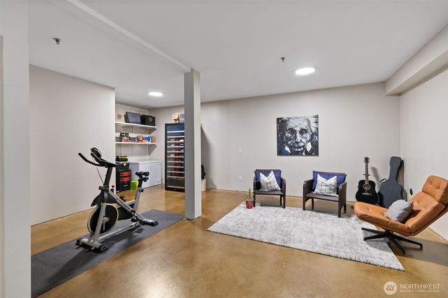 Finished bonus room space in the garage. Could potentially be completed to add a 459sf addition to the home | Image 33