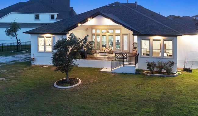 Back of property featuring a huge backyard and garden | Image 34