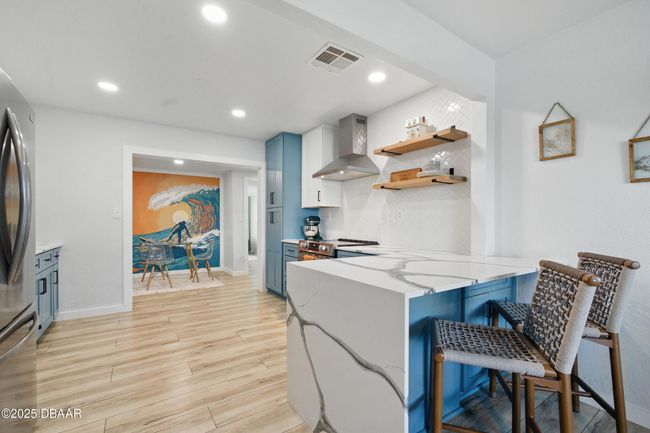 Entering the kitchen from the living room | Image 8