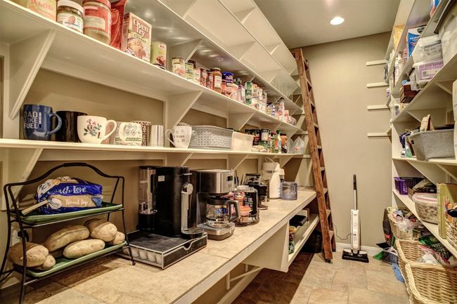 True walk-in pantry with amazing storage space. | Image 9