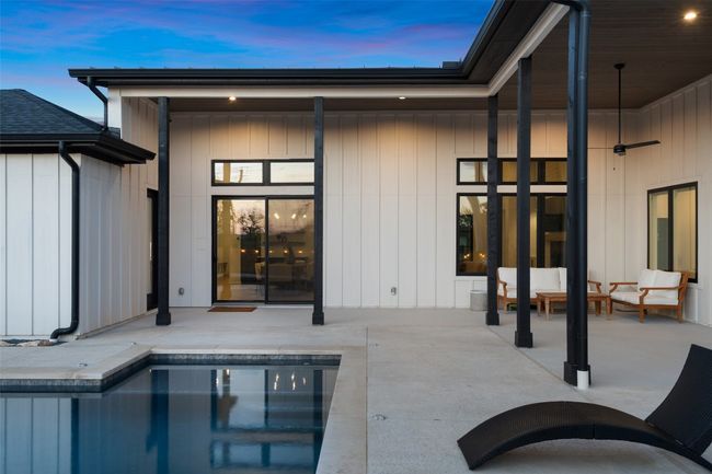 Brand new custom designer pool and large pool deck. | Image 34