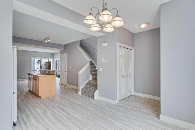 135 Bridlewood View Sw, Home with 4 bedrooms, 2 bathrooms and 3 parking in Calgary AB | Image 4