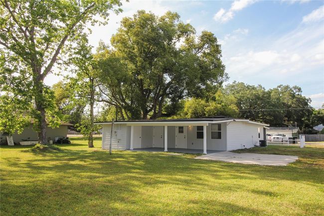Covered patio with exterior storage | Image 23