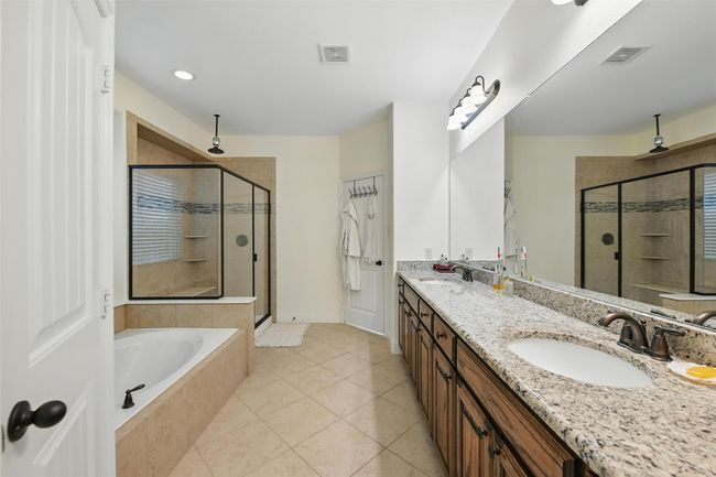 en-suite with large walk in closet | Image 14