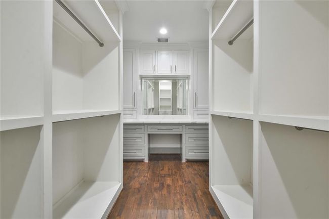 From the bathroom to your custom built vanity in the walkway to your primary closet | Image 20
