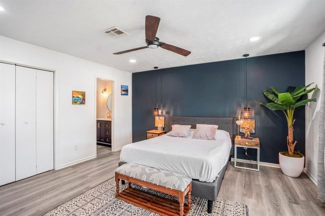 Another view of the primary suite—offering a spacious layout with direct access to the en-suite bath. | Image 19