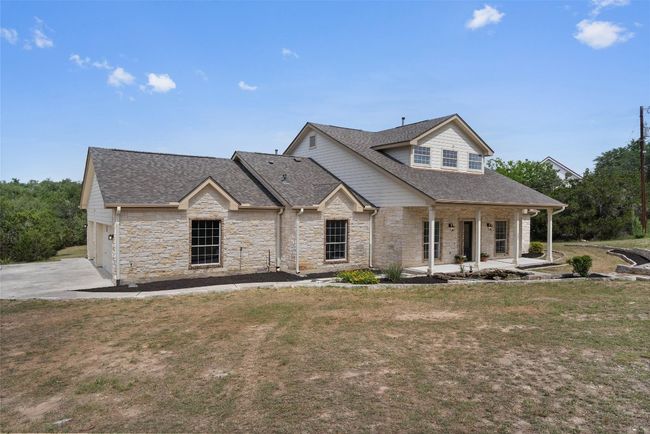 Side facing 2-car garage + converted single bay (with AC) for workshop / gym / studio | Image 5