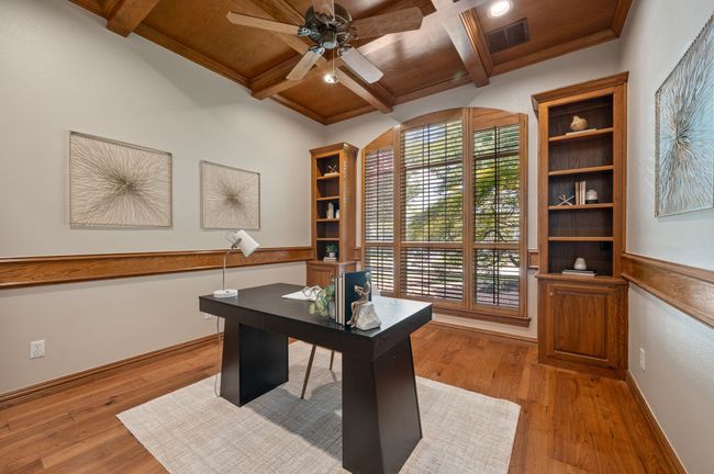 office with coffered ceiling, plantation shutters and built in shelves | Image 18