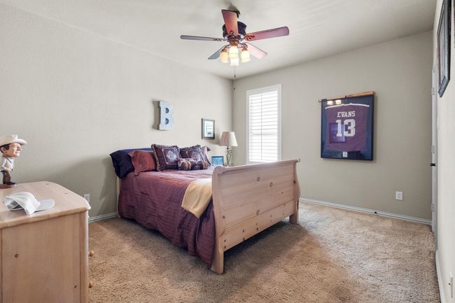 One of the three secondary upstairs bedrooms, all with walk-in closets | Image 30