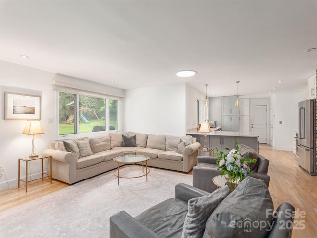 Family Room Looking Towards Kitchen | Image 14