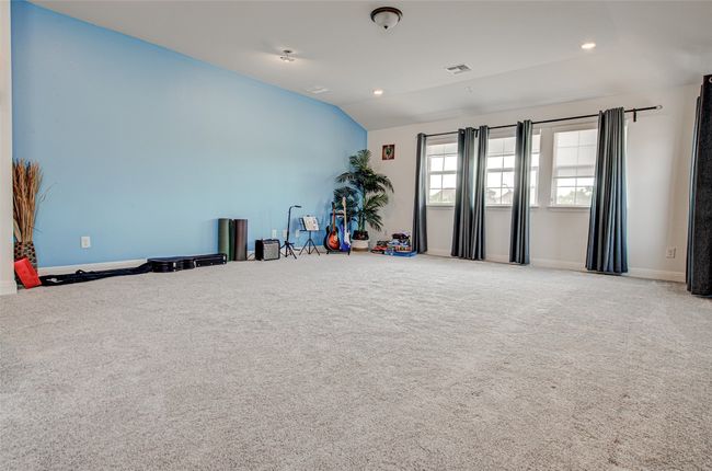 Spacious & Open Entertainment Room/Family Room/Game Room with lofted ceiling. Excellent View to Backyard, N Lakeline Road – Second Floor | Image 18
