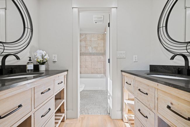 Full bathroom featuring vanity and wood finished floors | Image 33