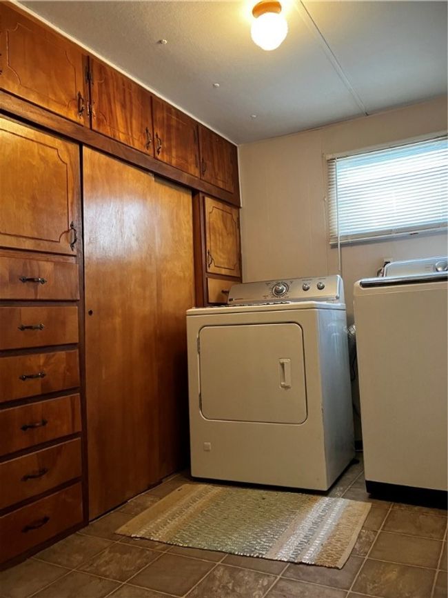 Nice storage in laundry room | Image 7