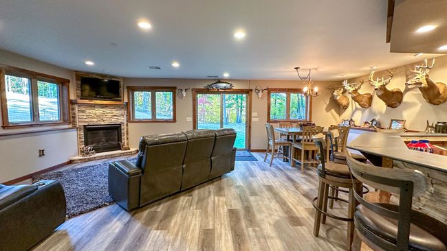 Lower gathering room with fireplace | Image 20