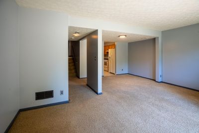 Lower Level with Living Room, Dining Room, Kitchen, & Half Bath. | Image 2