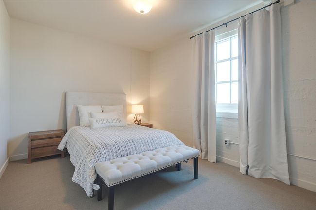 Bedroom with light carpet | Image 31