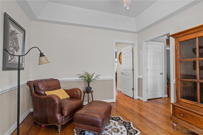 Formal sitting room or dining area off of the kitchen and the foyer | Image 11