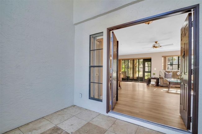 Gracious travertine flooring & double door front entry~ | Image 5