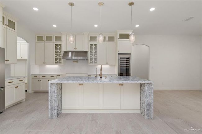 Soft-close drawers, designer hardware, and under-cabinet lighting elevate both form and function. | Image 8