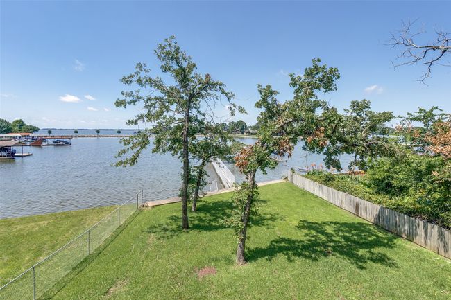 View of yard featuring a water view | Image 20
