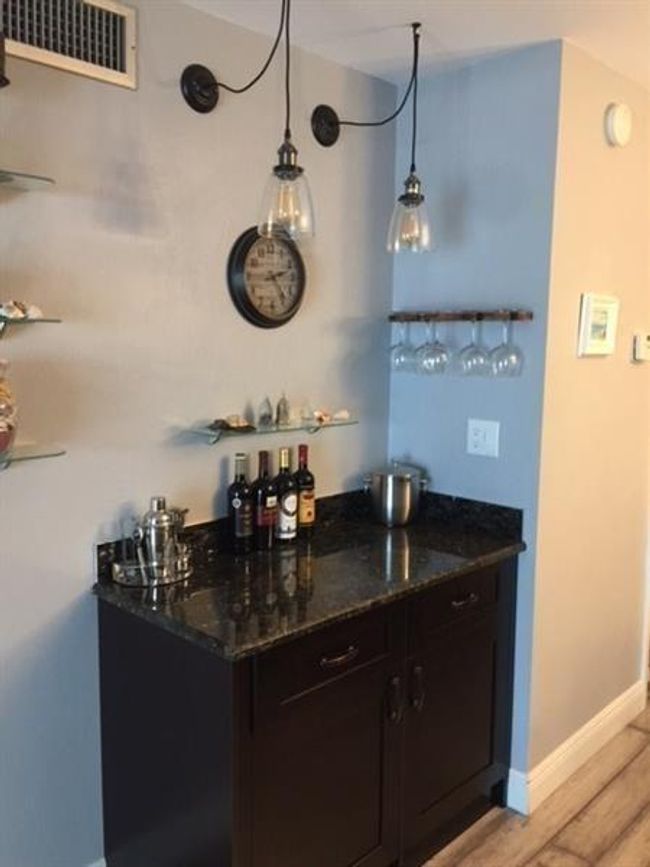 dry bar with fridge in cabinet | Image 8