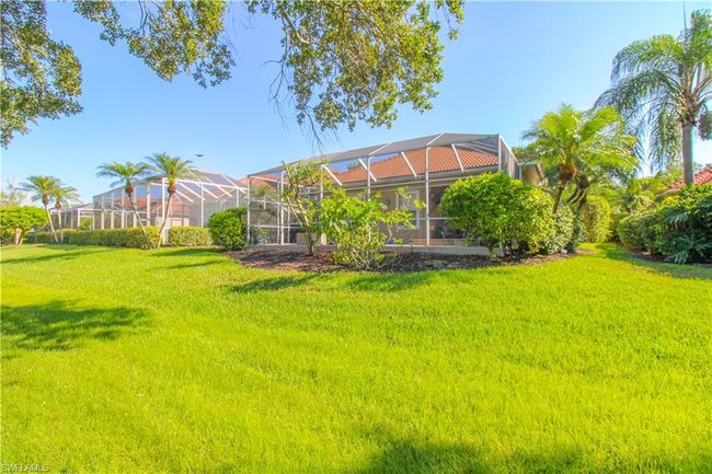 View of yard with glass enclosure | Image 9