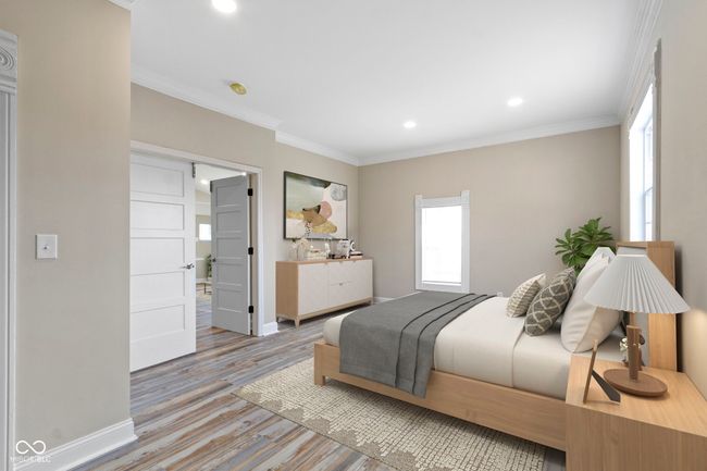 bedroom featuring light wood finished floors, baseboards, ornamental molding, and recessed lighting | Image 18