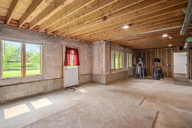 Walkout to your pond views! Look at the big windows too. | Image 24