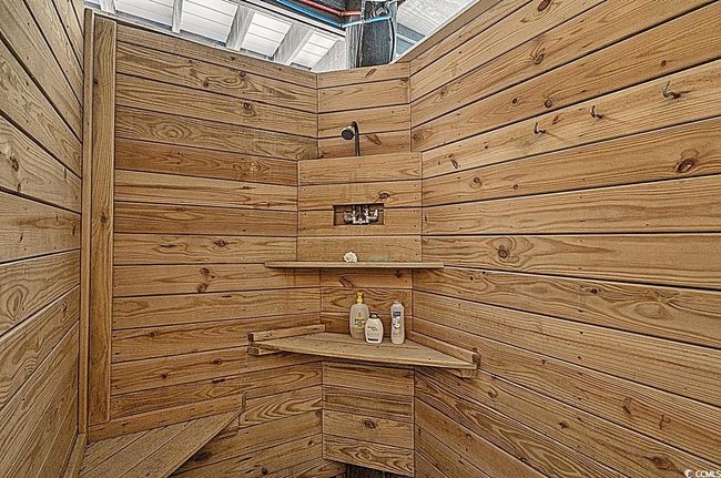 Exterior details with a tile shower | Image 22