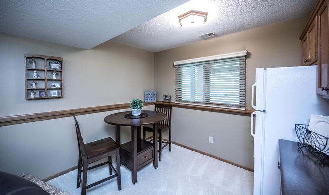 Family room with nice game & table area & windows to backyard. | Image 28