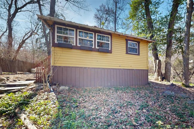 View of home's exterior featuring fence | Image 24
