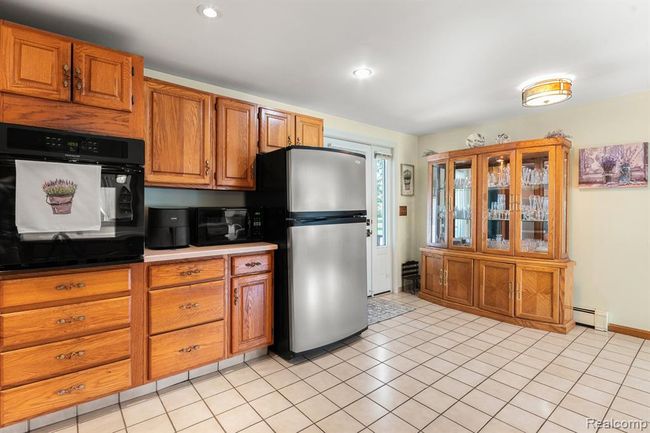 8856 Kingsley Drive, Home with 3 bedrooms, 3 bathrooms and null parking in Cambridge Twp MI | Image 6