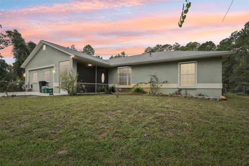 1594 Papaya St, Bunnell, FL, 32110-6657 | Card Image