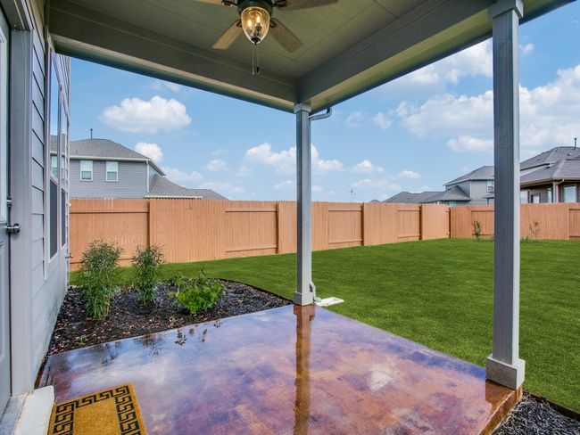 View of patio featuring a ceiling fan | Image 21