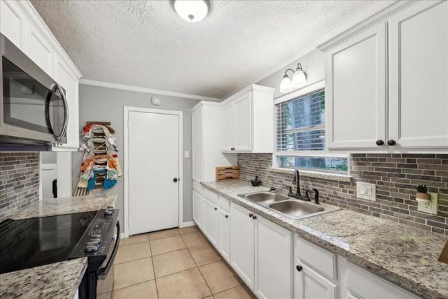 1845 King Arthur Ct, House other with 3 bedrooms, 2 bathrooms and null parking in Orange TX | Image 13
