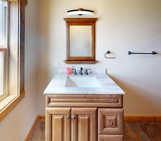Bathroom with baseboards and vanity | Image 17