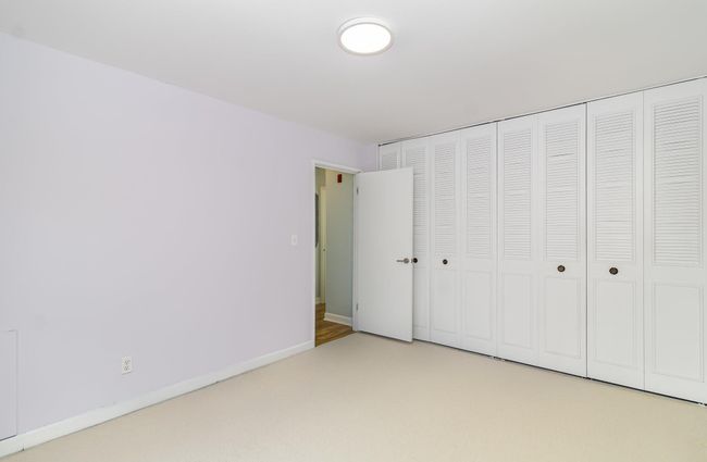 Another full wall of floor-to-ceiling closets | Image 12