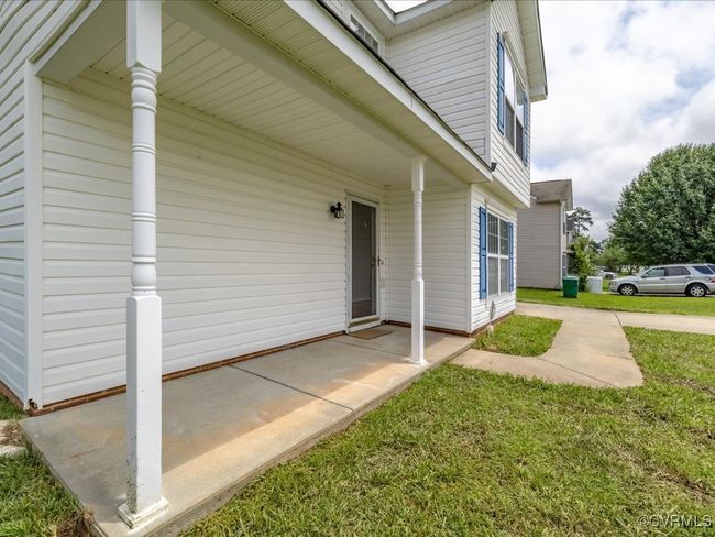 Entrance to property featuring a lawn | Image 5