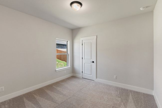 Spare room with light colored carpet and a smoke detector | Image 17
