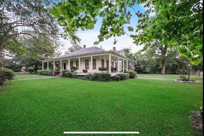 301 Slade Street, Home with 3 bedrooms, 1 bathrooms and null parking in Coldspring TX | Image 1