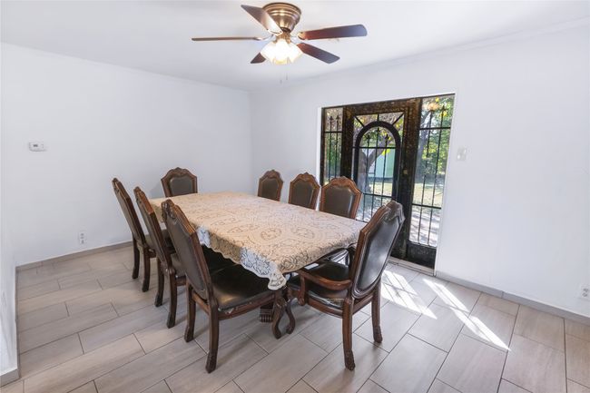 Dining space with ceiling fan | Image 6