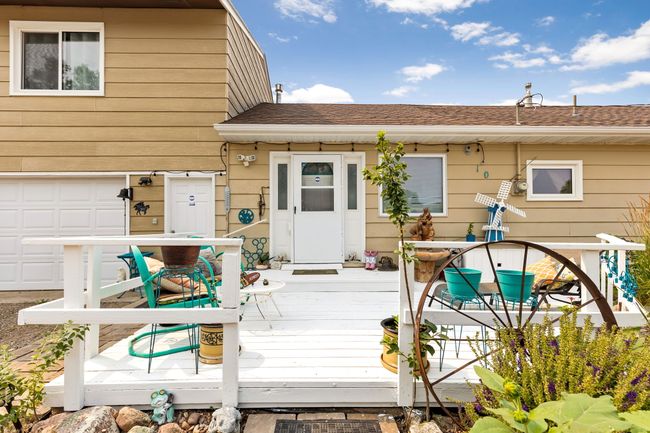View of wooden deck on front of home | Image 9