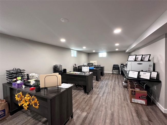 Office featuring wood finished floors and recessed lighting | Image 11