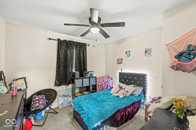 bedroom featuring carpet flooring and ceiling fan | Image 13