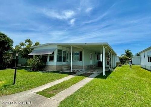 911 Oriole Cir, Barefoot Bay, FL, 32976-7518 | Card Image