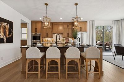 Photo is of the actual model. The stunning kitchen is the perfect place to cook a delicious meal! | Image 2